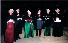 Carolers Sing at Night