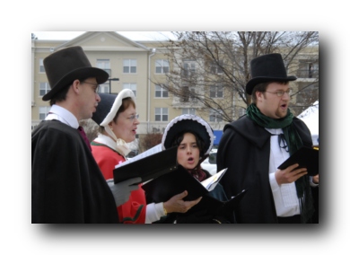 Carolers Sing at Night